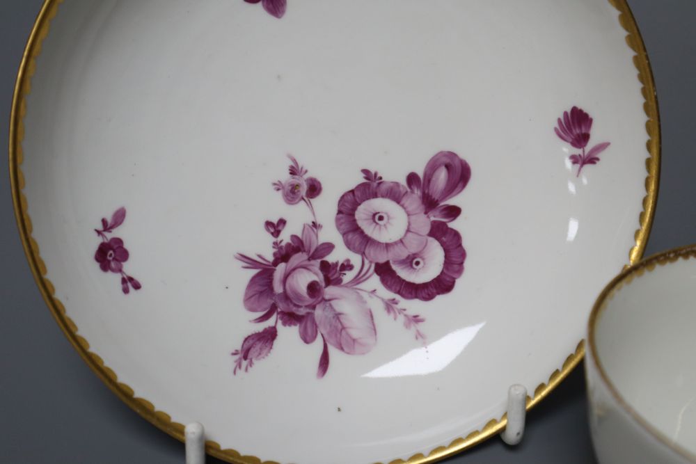 A Vienna puce en camaieu cup and trembleuse saucer, diameter 13.5cm (repair) and a similar Furstenburg cup and saucer, late 18th centur